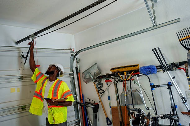 Professional Garage Door Roller Replacement technician working in Island City, OR